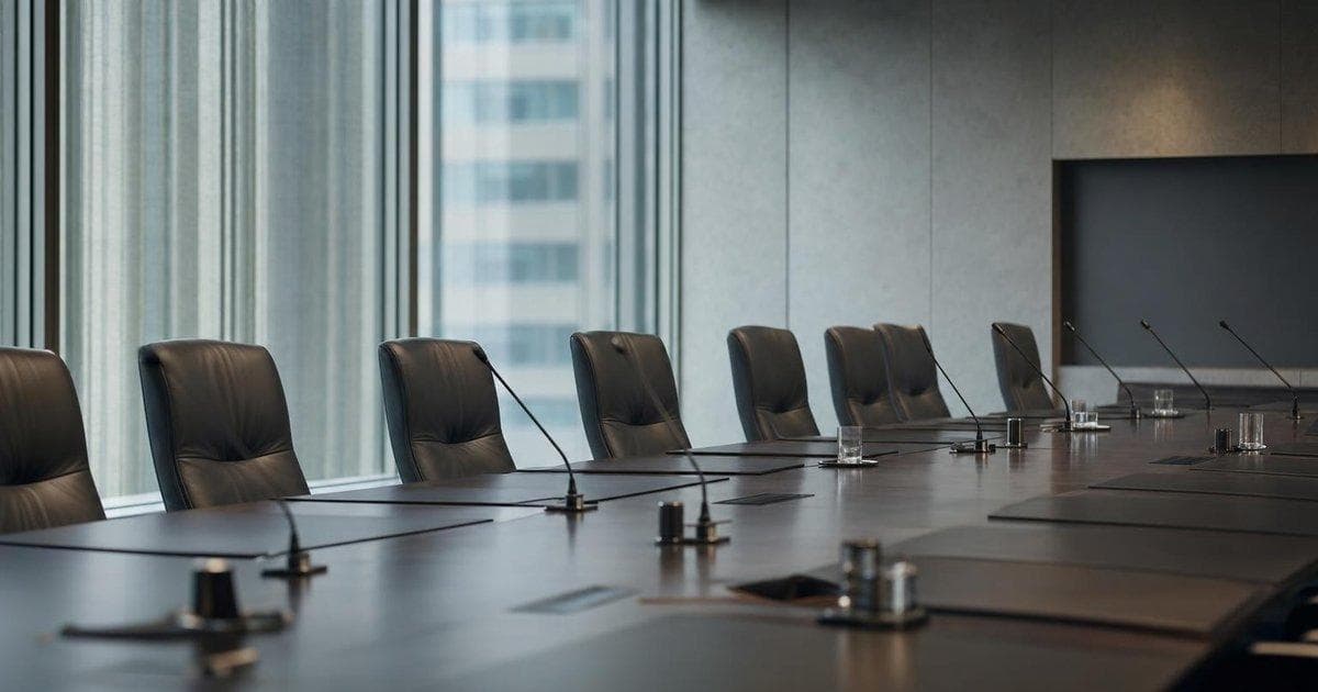 Central bank conference room symbolizing BOJ policy shift and impact on yen and Japanese equities