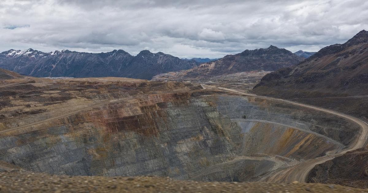 Expansive open-pit gold and copper mine illustrating 2026 stock outlook for B
