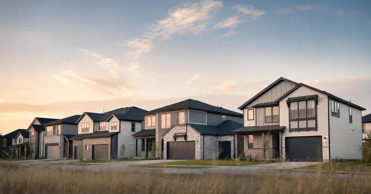 New suburban homes in a large development illustrating homebuilder M&A deal and housing sector shift