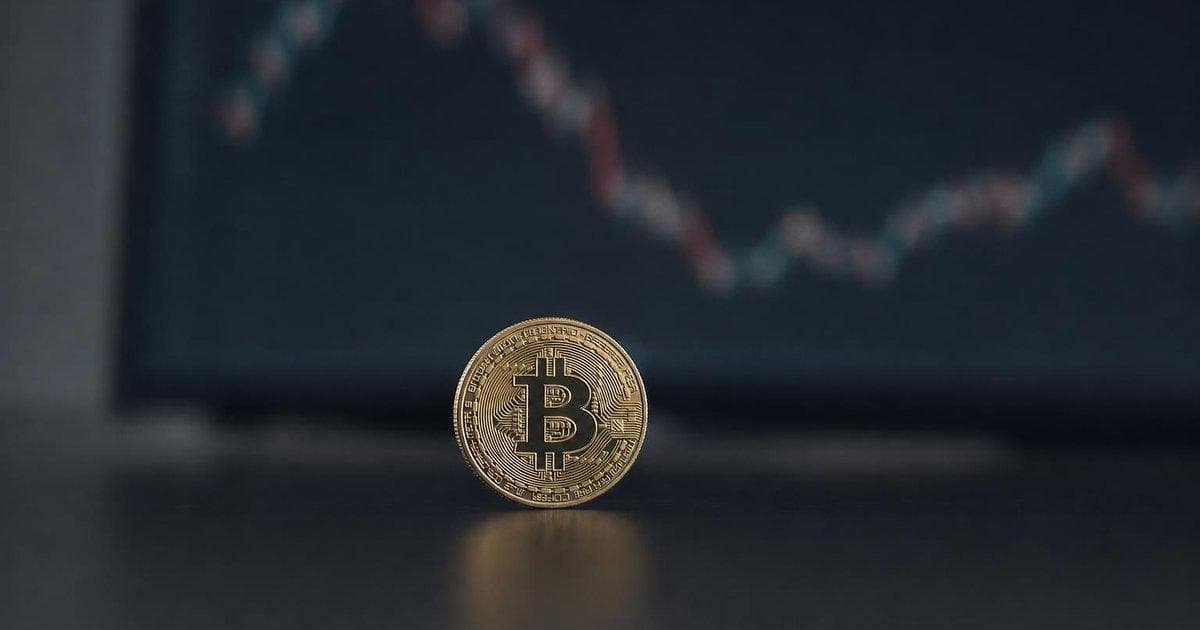 Physical-style crypto tokens on a dark trading desk as analysts warn of crowded token market risk