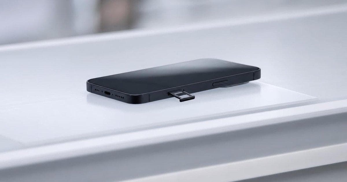 Unbranded smartphone and SIM card on display illustrating relaunch of a consumer mobile brand