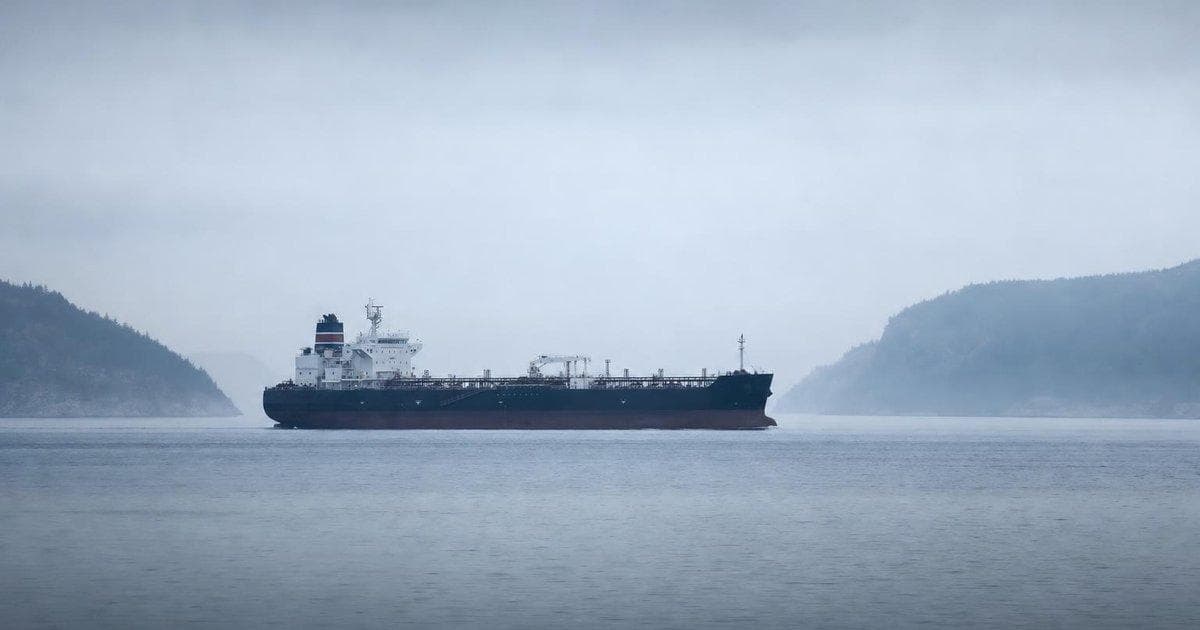 Oil tanker transiting a tense Gulf shipping lane amid rising security warnings over maritime trade