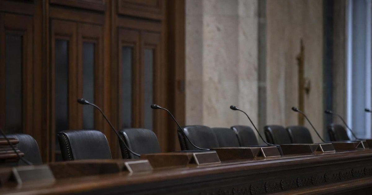 Empty government hearing room symbolizing DOJ $1.7B anti-weaponization oversight fund debate
