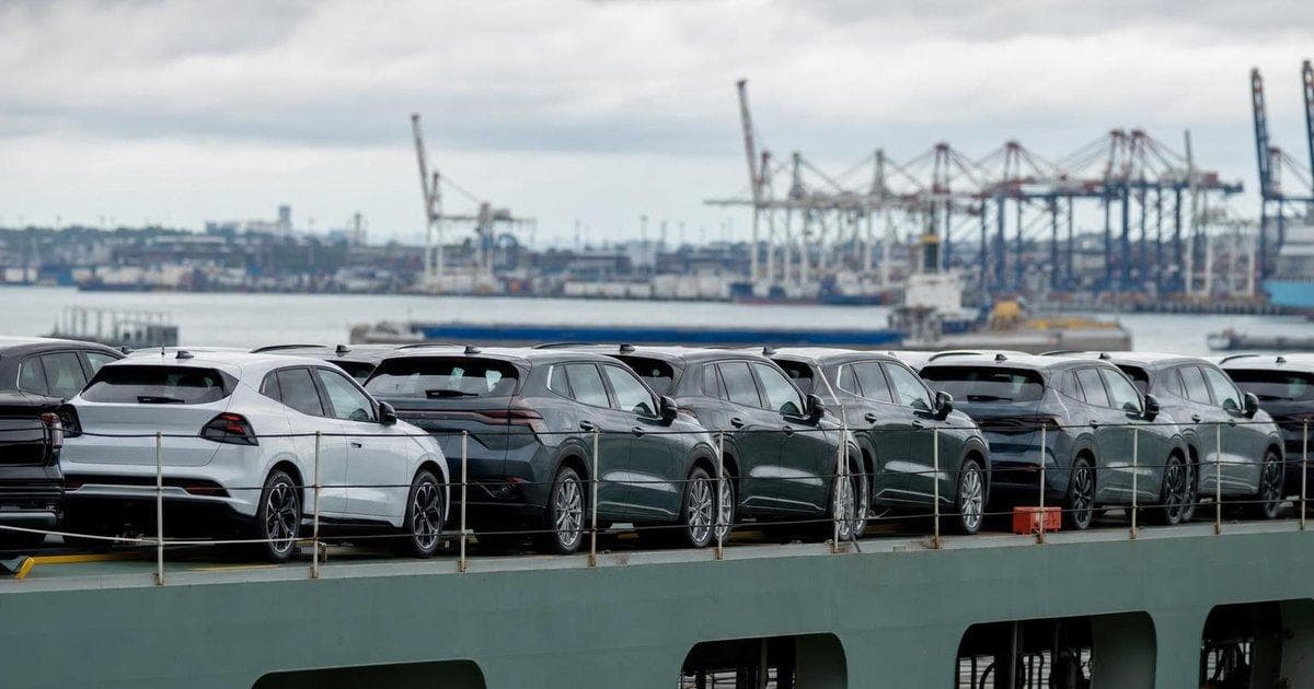 Cars on a ship at a commercial port, illustrating EU-US trade pact talks and 25% auto tariff risk