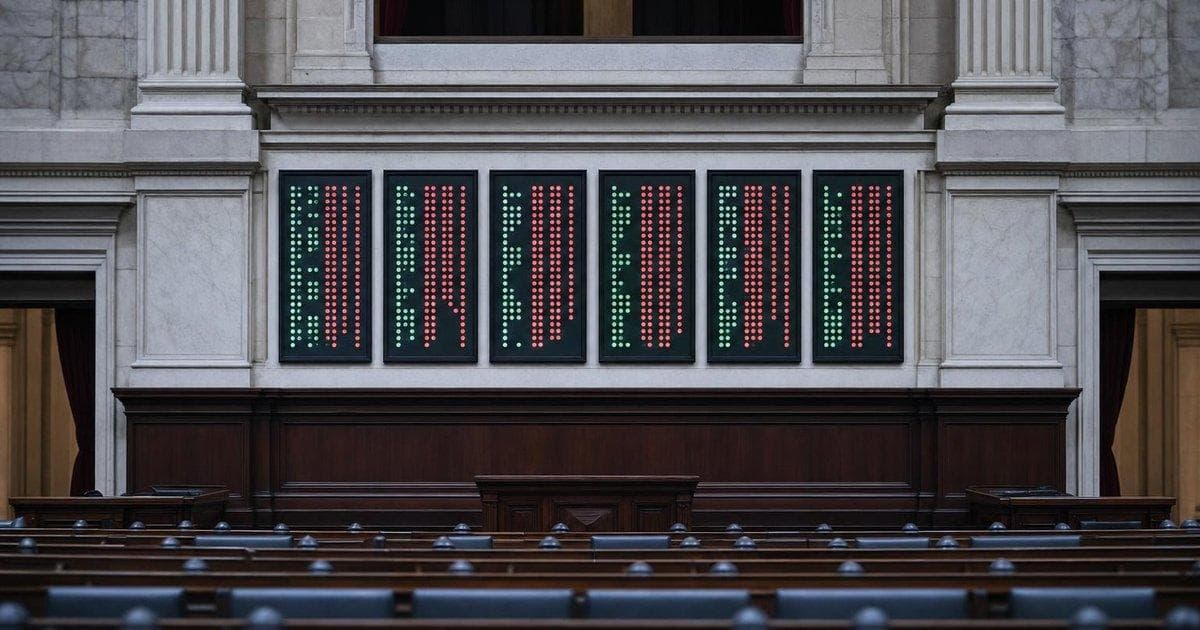 Legislative voting boards in a parliament chamber as lawmakers advance Ukraine aid and Russia sanctions bill