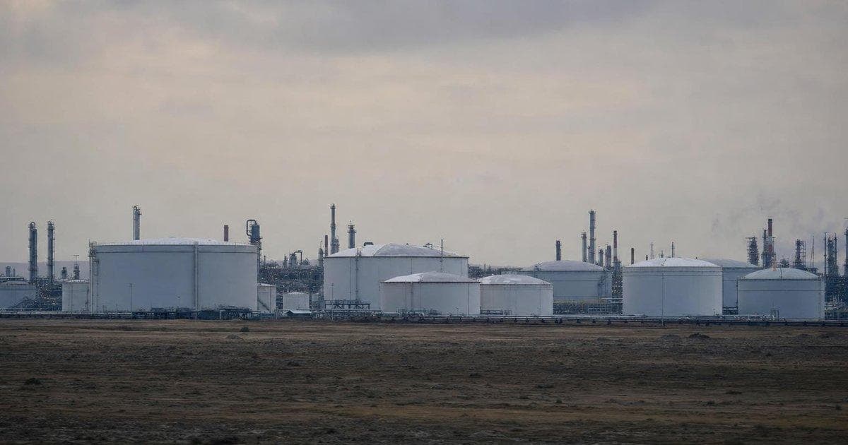 Oil storage tanks at a refinery complex as markets weigh energy stocks and inflation risks