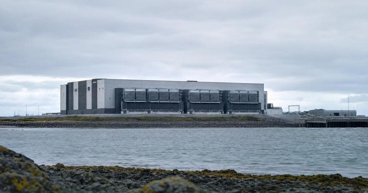 Modern AI data center complex near coast symbolizing new green AI hub project in India