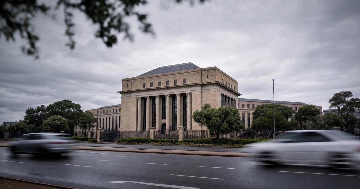 Central bank building as policymakers hold rates and tighten liquidity amid inflation risks