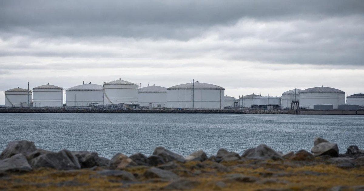 Crude oil storage tanks at a coastal terminal as markets watch summit headlines for oil price direction