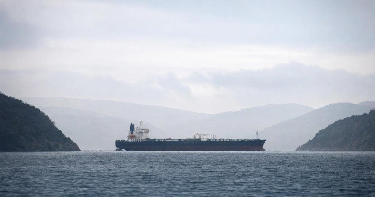 Crude oil tanker in narrow strait as tensions threaten Hormuz shipping and energy supply routes