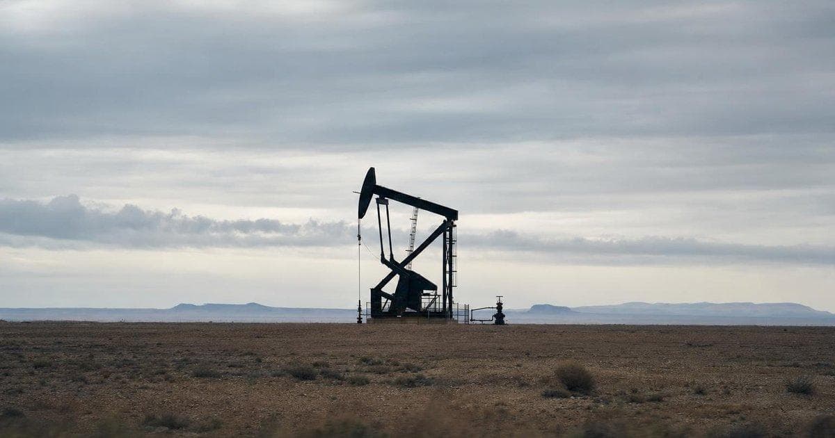 Oil pumpjack in desert oil field illustrating modest OPEC+ July quota increase in crude supply