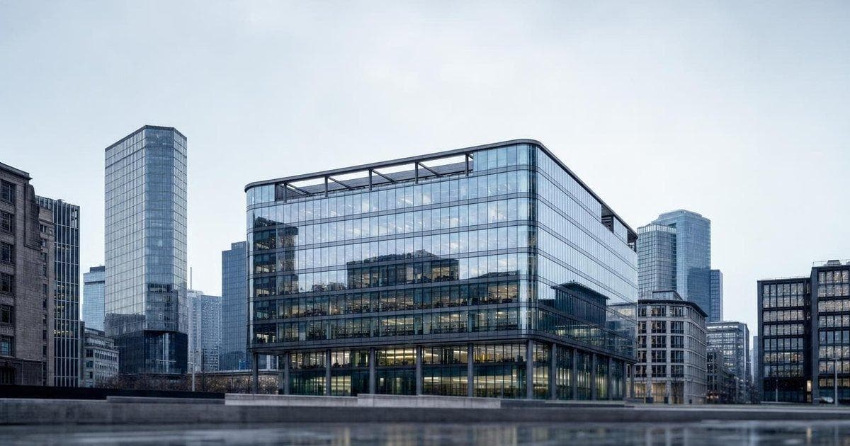 Glass tech office building in financial district symbolizing confidential AI IPO plans