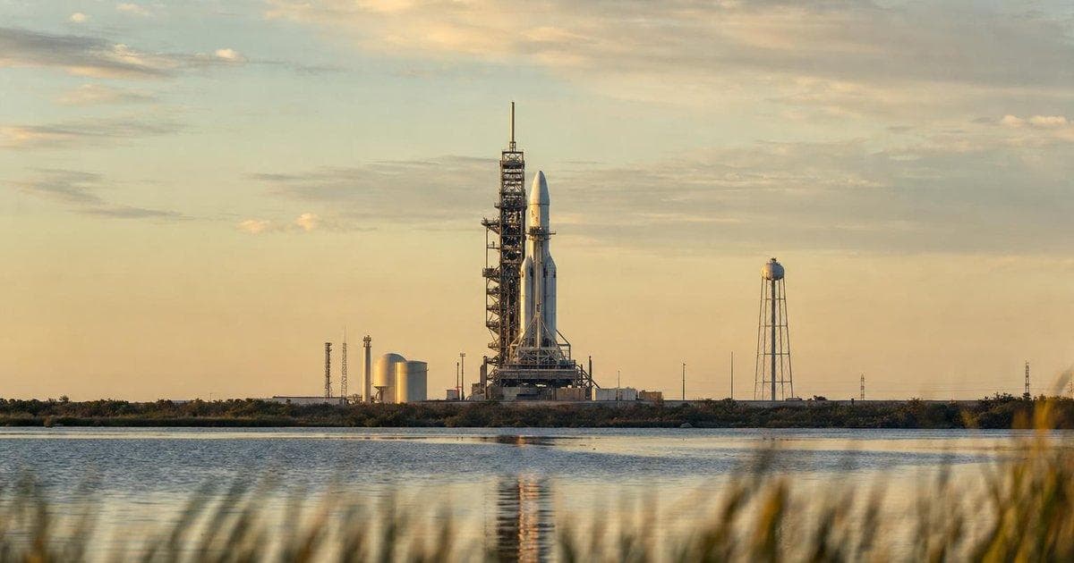 Commercial rocket on launch pad symbolizes rally in space stocks and aerospace sector on IPO plans news
