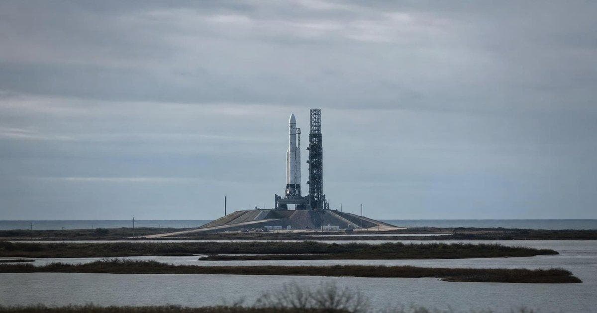 Heavy-lift rocket on launch pad at cloudy spaceport after scrubbed test ahead of planned IPO