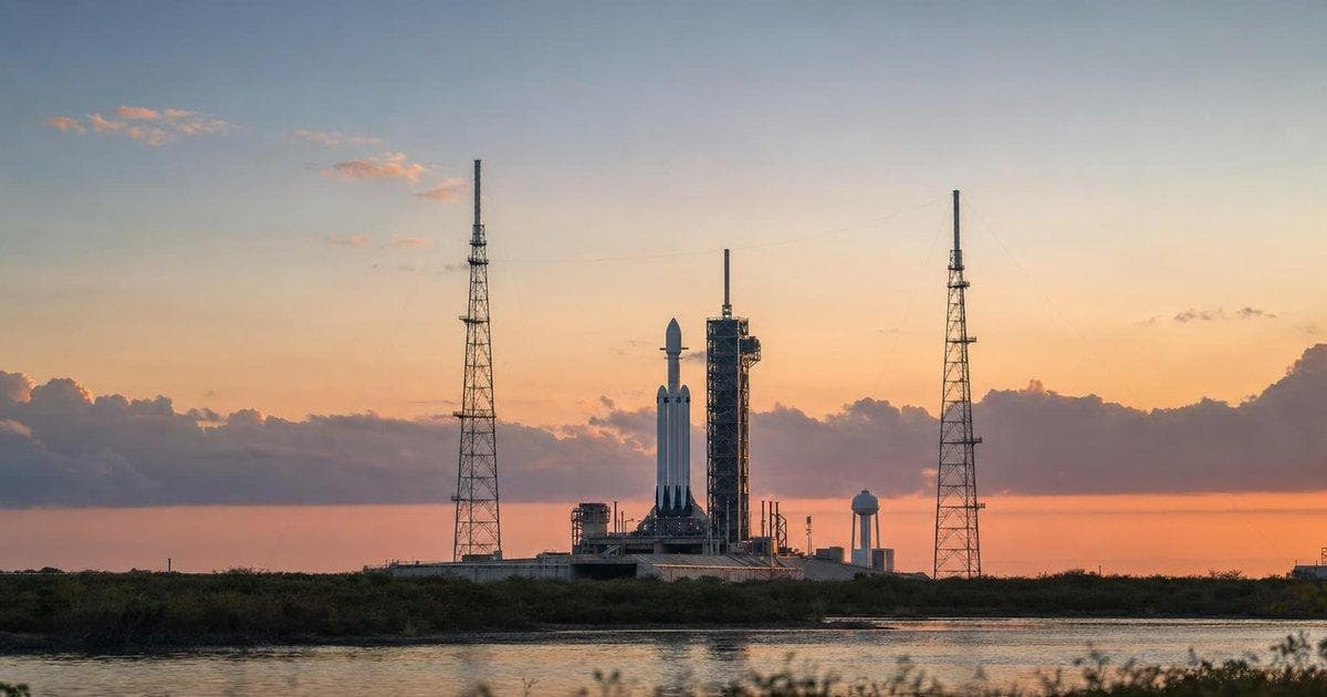 Orbital rocket on launch pad symbolizing blockbuster aerospace IPO and AI-satellite expansion plans