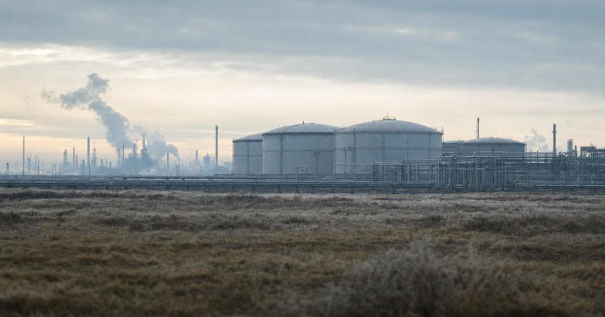 Oil storage tanks at an energy facility after strikes, illustrating disruption to Russian crude infrastructure