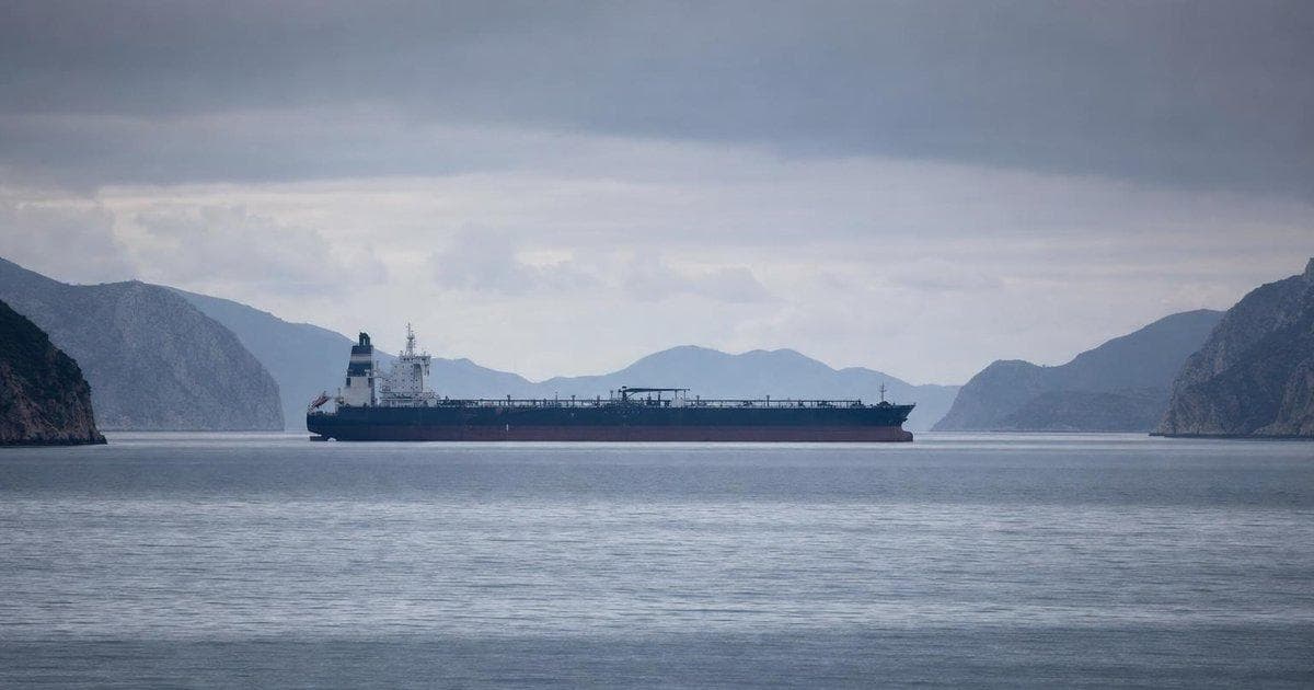 Oil tanker transiting a narrow strait as markets watch Iran Gulf shipping and sanctions framework