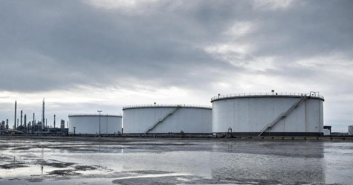 Crude oil storage tanks at an industrial terminal as US crude stocks log sixth weekly draw
