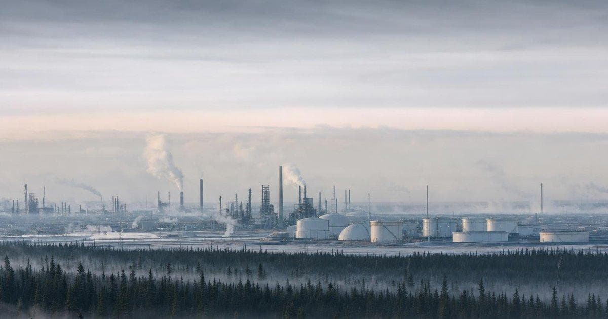Oil sands facility near smoky boreal forest as wildfires threaten regional bitumen output